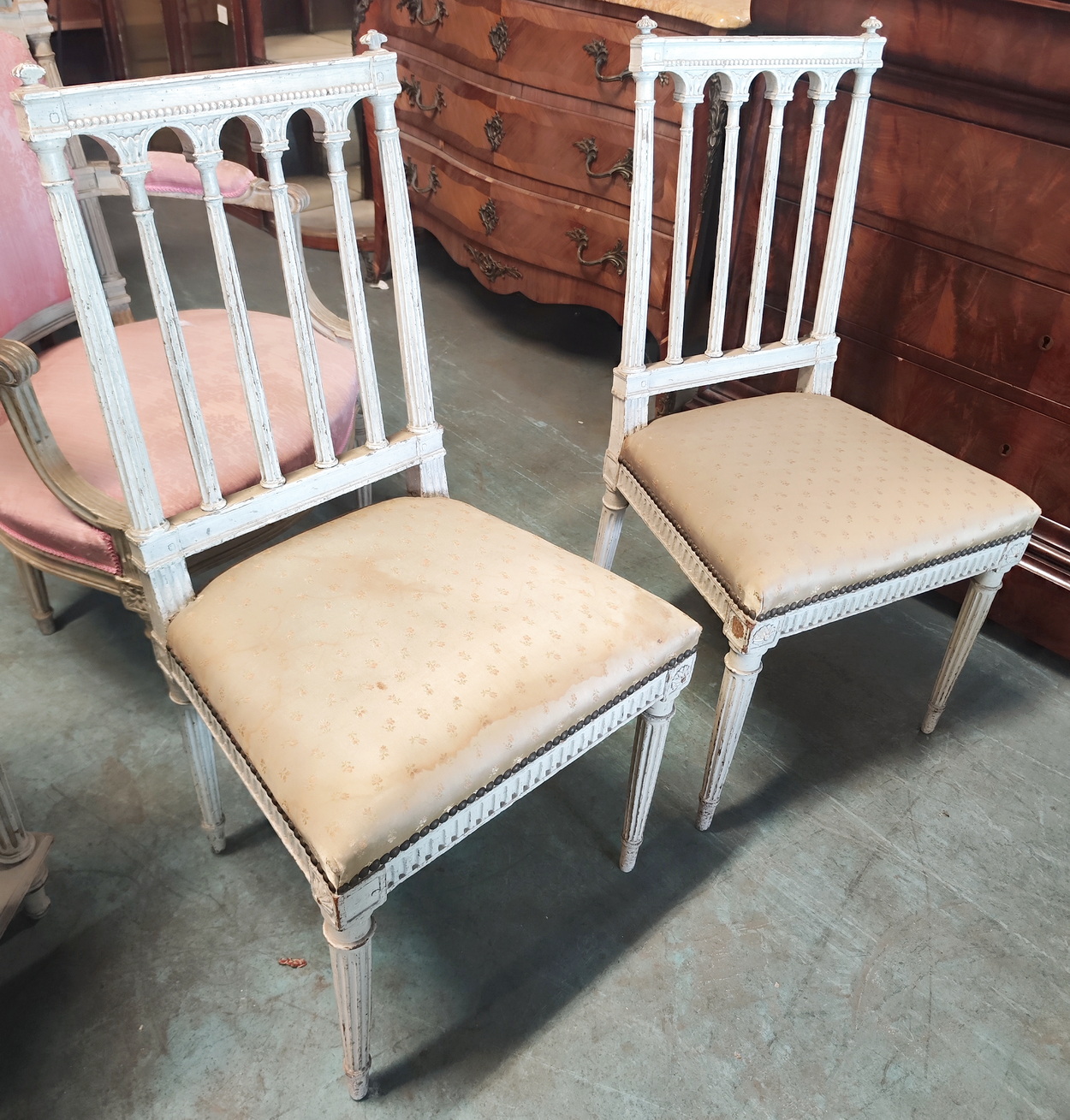 A pair of French Hall Chairs 